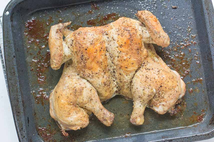 https://www.fodmapeveryday.com/wp-content/uploads/2018/01/roasted-spatchcocked-chicken-on-pan.jpg