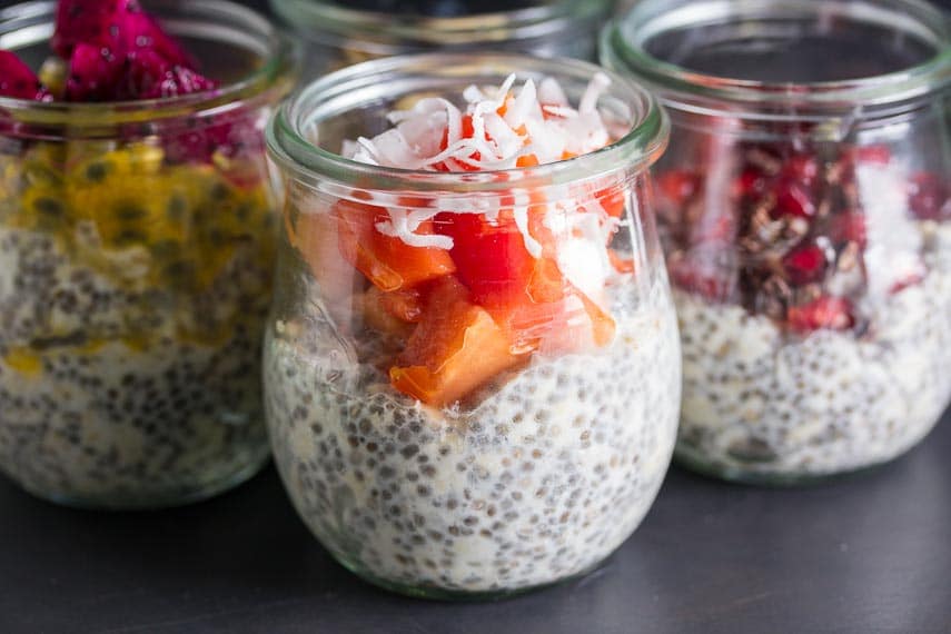 https://www.fodmapeveryday.com/wp-content/uploads/2019/07/glass-jar-of-overnight-oats-and-chia-topped-with-papaya-and-coconut-against-dark-background.jpg