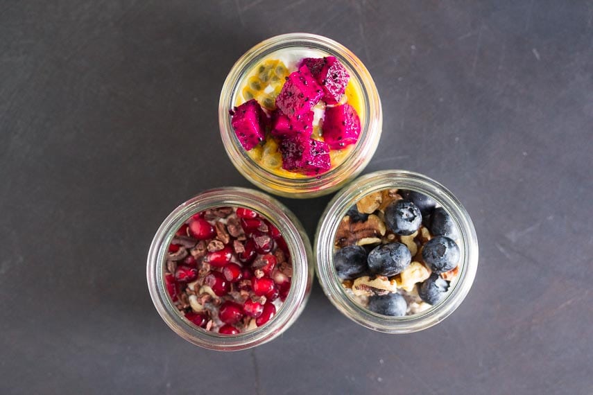 https://www.fodmapeveryday.com/wp-content/uploads/2019/07/overhead-shot-of-a-trio-of-overnight-oats-and-chia-in-glass-bowls-topped-with-colorful-fruit.jpg