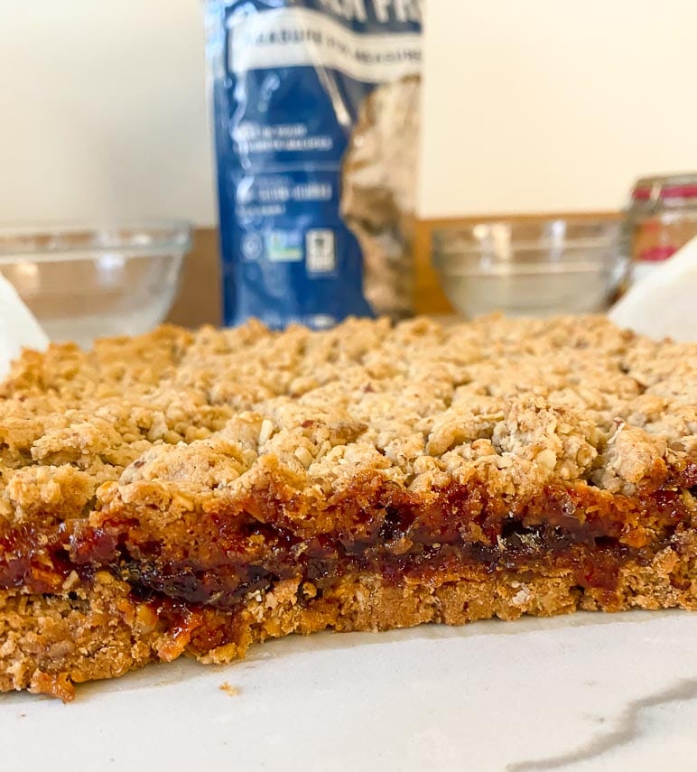 a look at the side of our unmolded Nutty Low FODMAP Strawberry Oat Bars