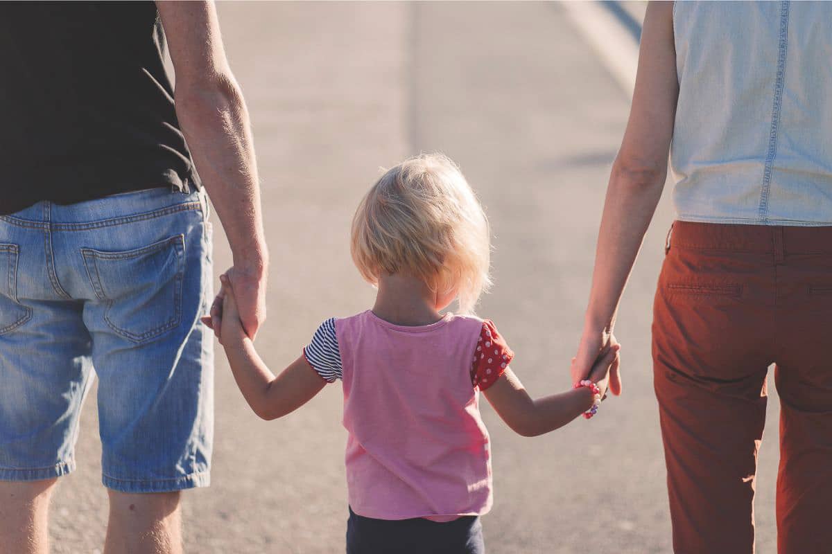 family holding hands.