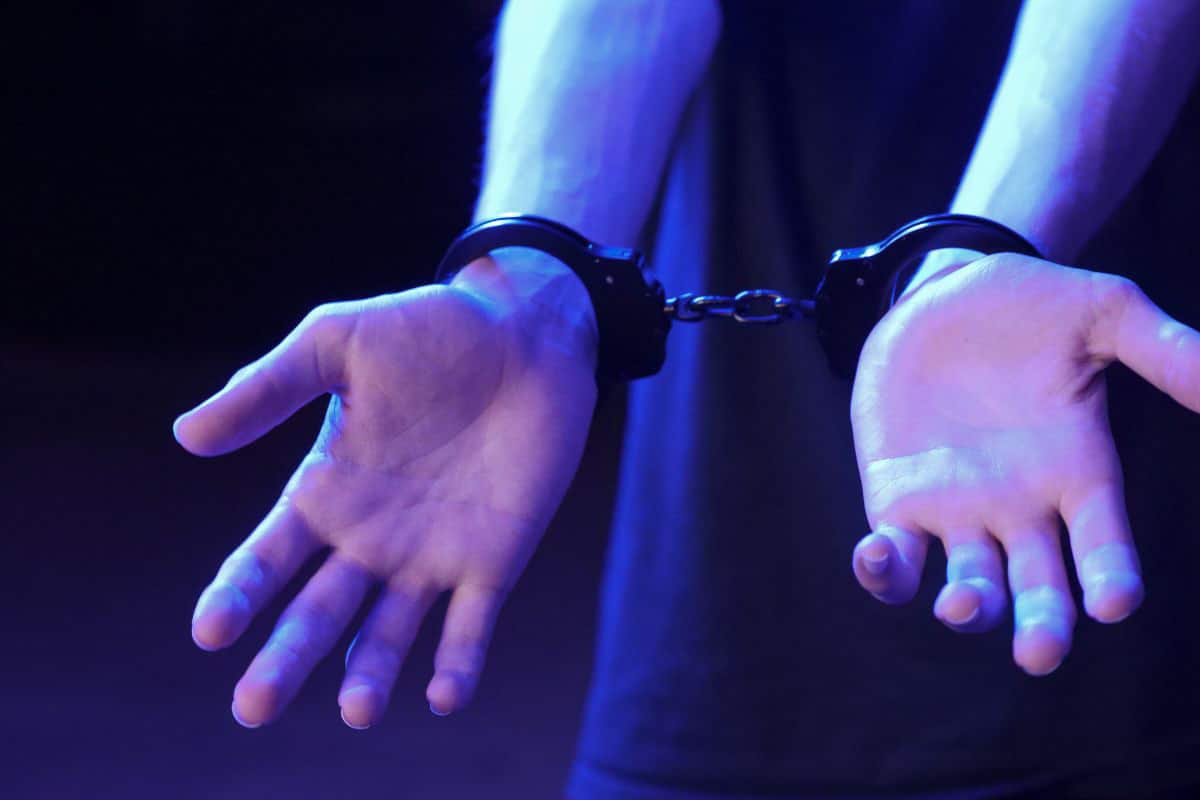 man in handcuffs.