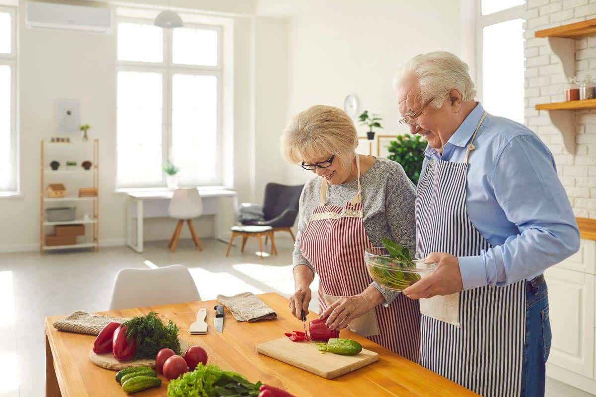 older couple cooking.
