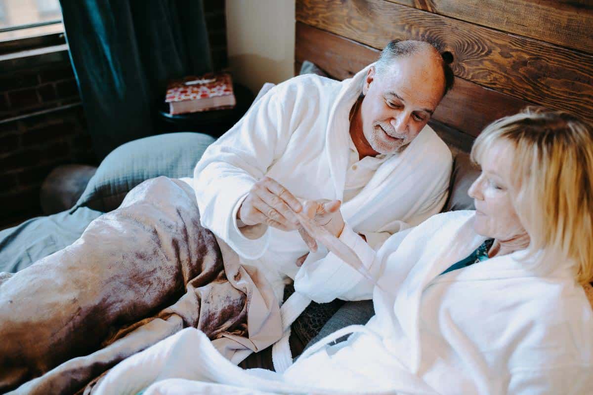 happy couple in bed.