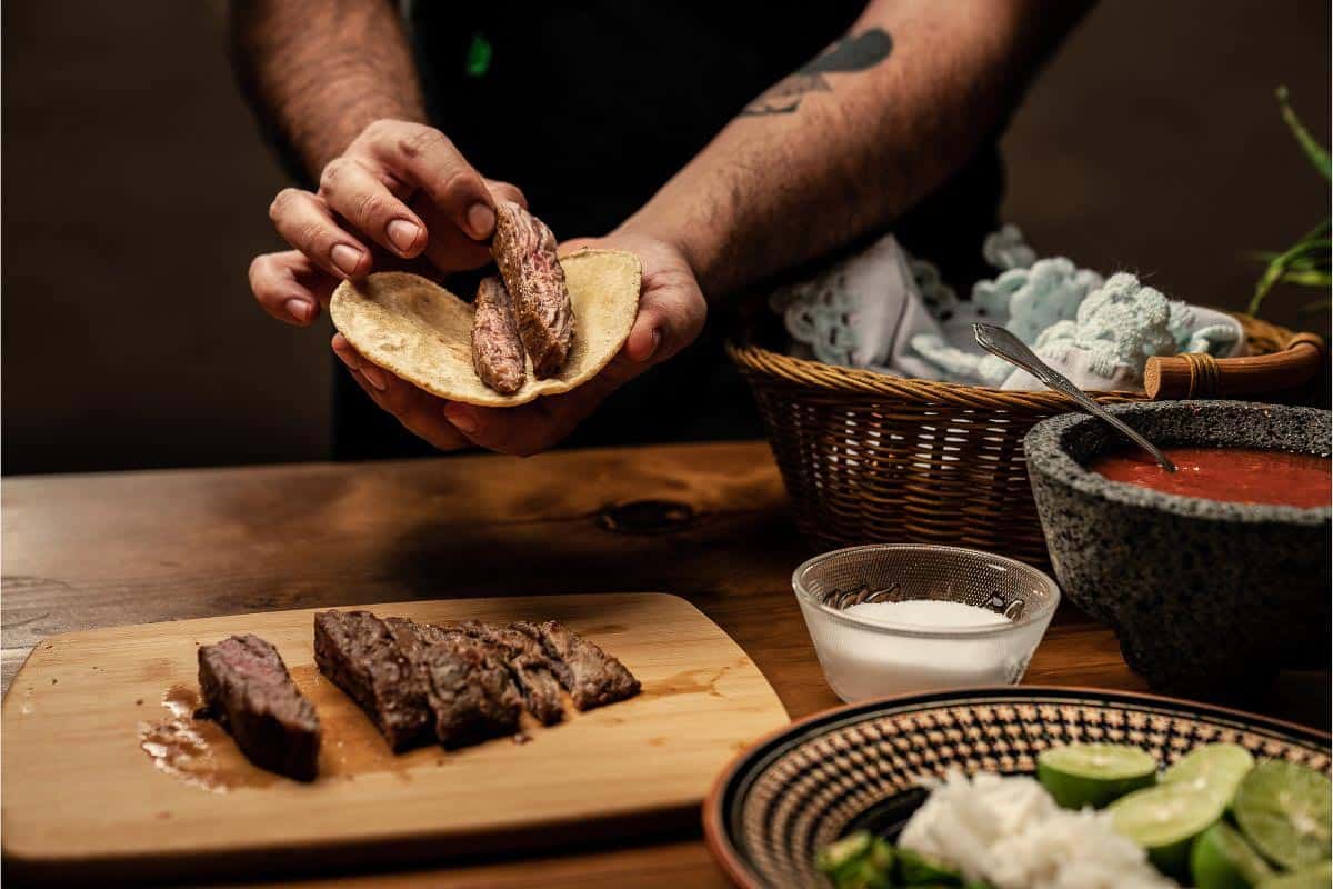 Man making steak fajitas. 