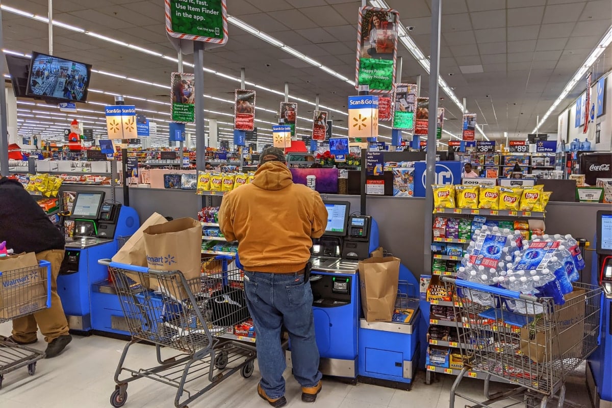 Walmart retail store self service cash register check out scan and go machines, Lynn Massachusetts USA. December 20, 2019