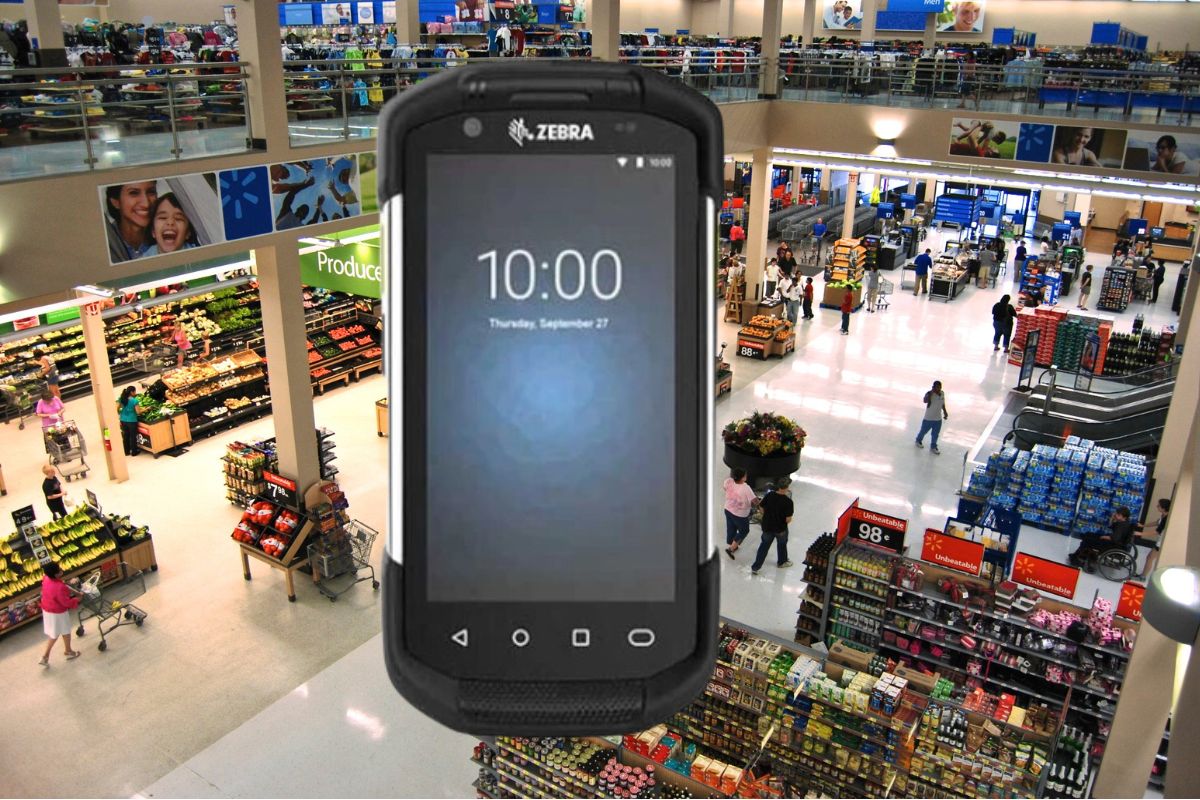 TC device over photo of Walmart store. 