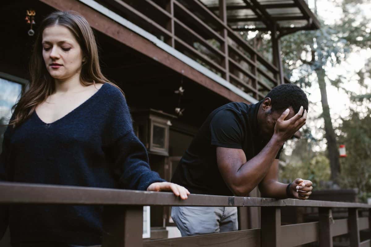 Woman walking away from man.