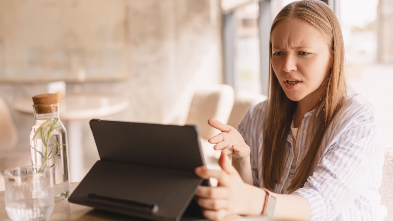 woman not happy with information online. 