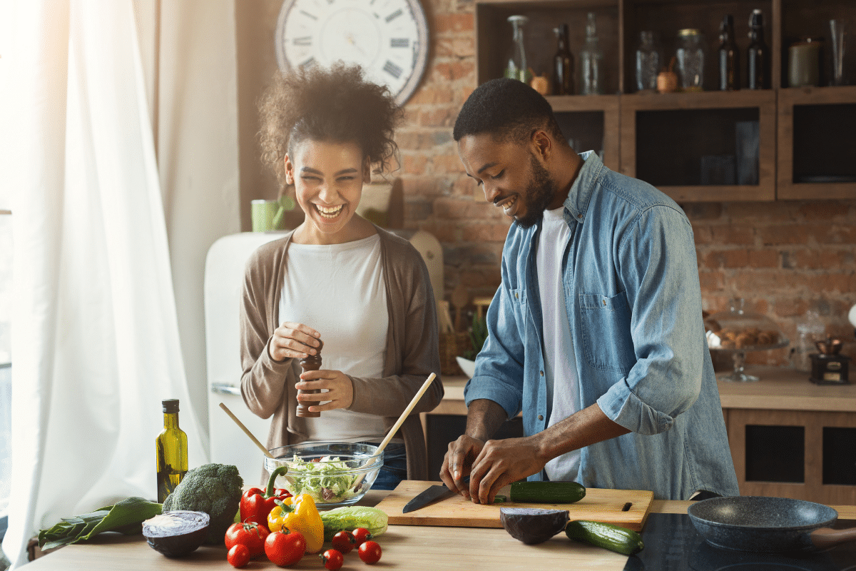 couple cooking together.