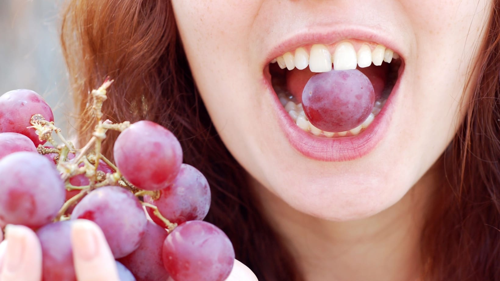 Eating grapes. 