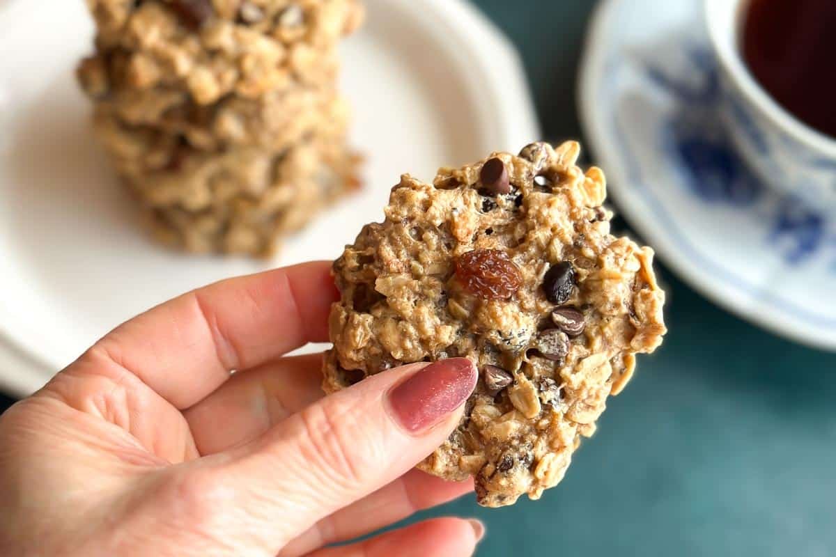 Low FODMAP High Protein Peanut Butter Banana Cookies held in hand close up.