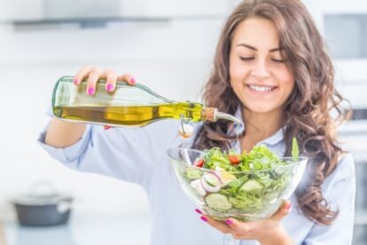 pouring salad oil.