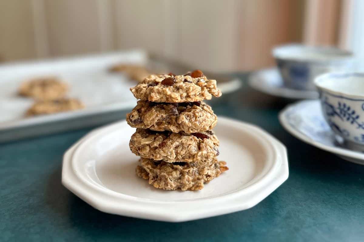 stack of Low FODMAP High Protein Peanut Butter Banana Cookies on white plate.