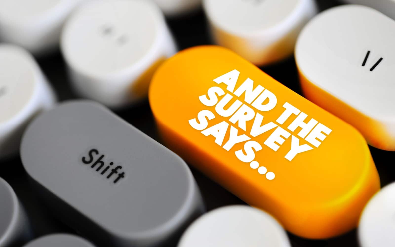 And The Survey Says is a phrase often used in the context of presenting or revealing the results of a survey or poll, text concept button on keyboard